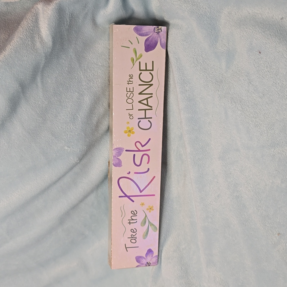"Take the risk or lose the chance" motivational wooden sign
